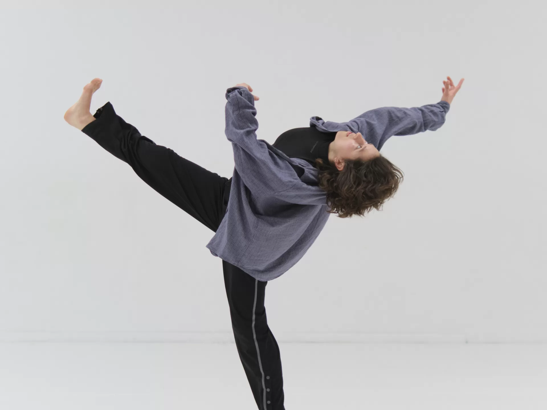 dancer in a white room, big cambré