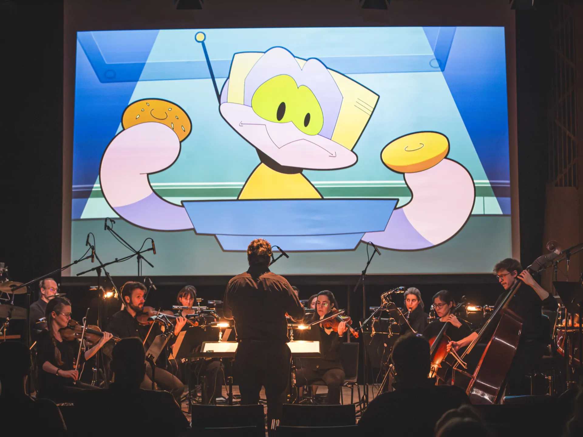Zeichentrickfilm + Dirigent + Orchester