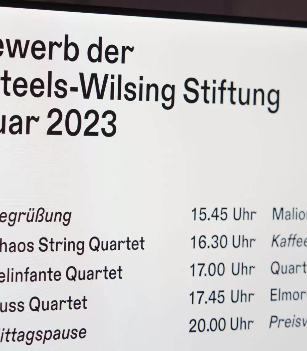 Bildschirm mit dem Text "Wettbewerb der Irene Steels-Wilsing Stiftung, 18. Januar 2023"