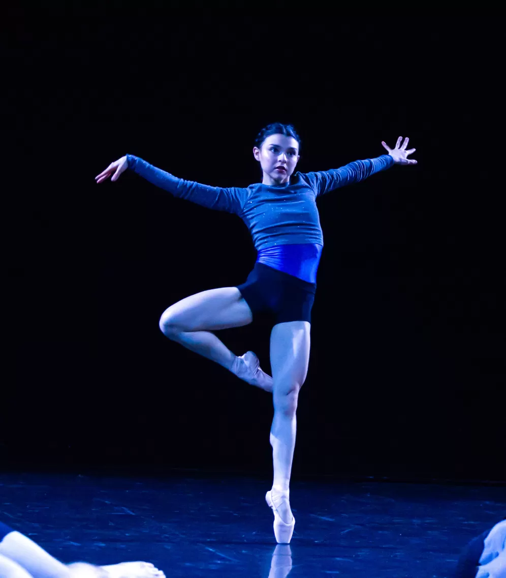 dancer on pintes blue leotard