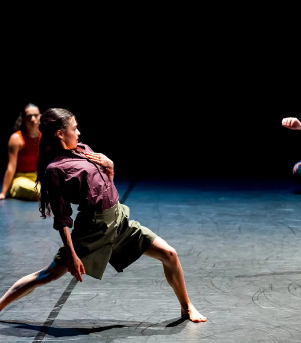 DANCING GIRL WITH HAND ON CHEST