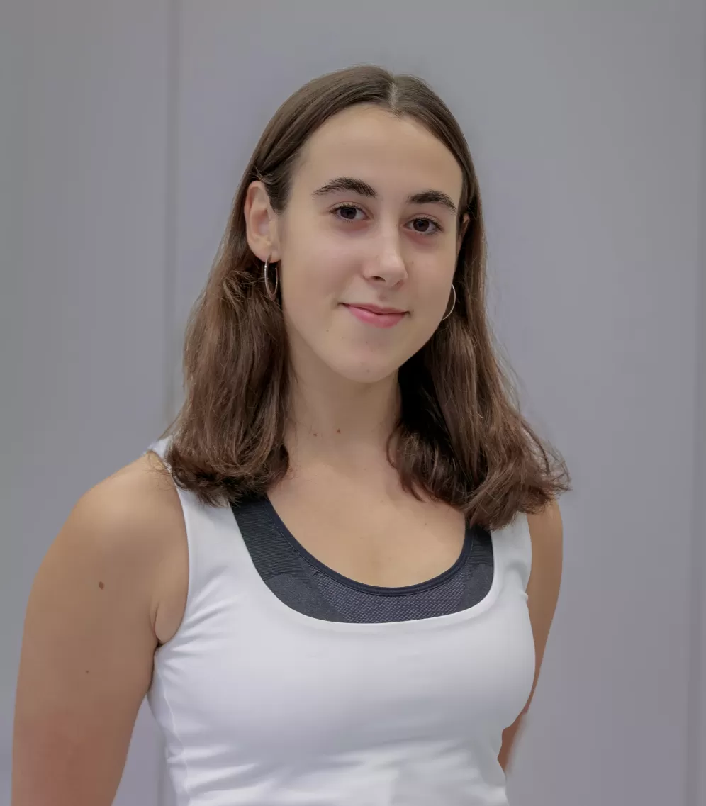 Portrait of a young woman in a white top