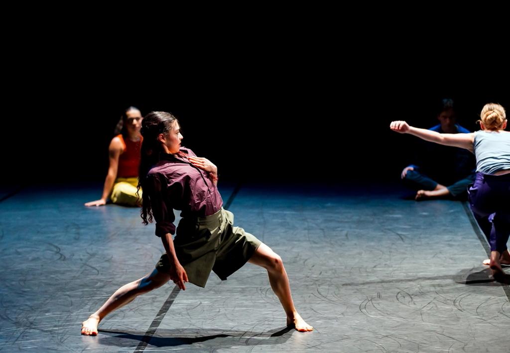 DANCING GIRL WITH HAND ON CHEST