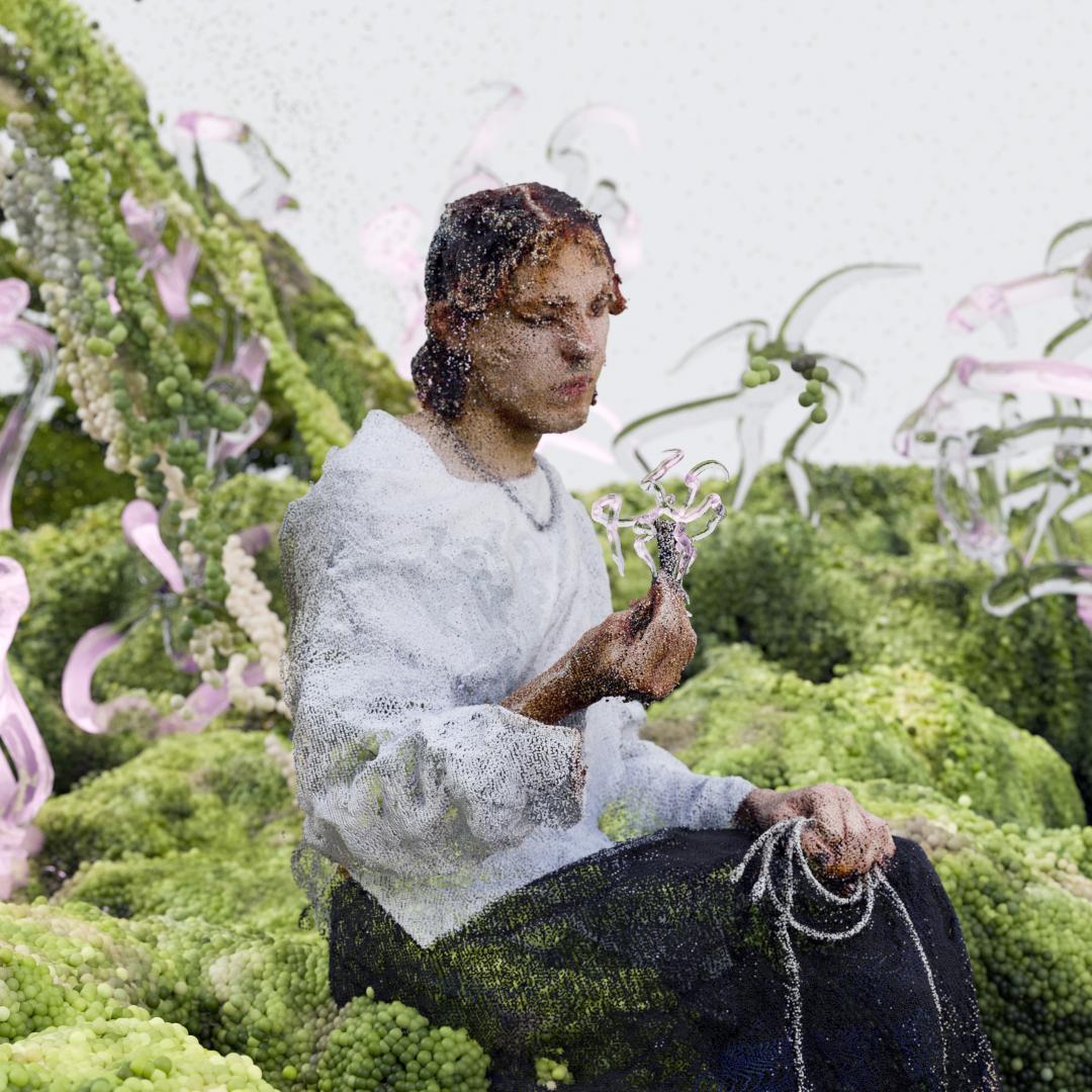 Maximilian Prag Jungre Mann auf Moos sitzend