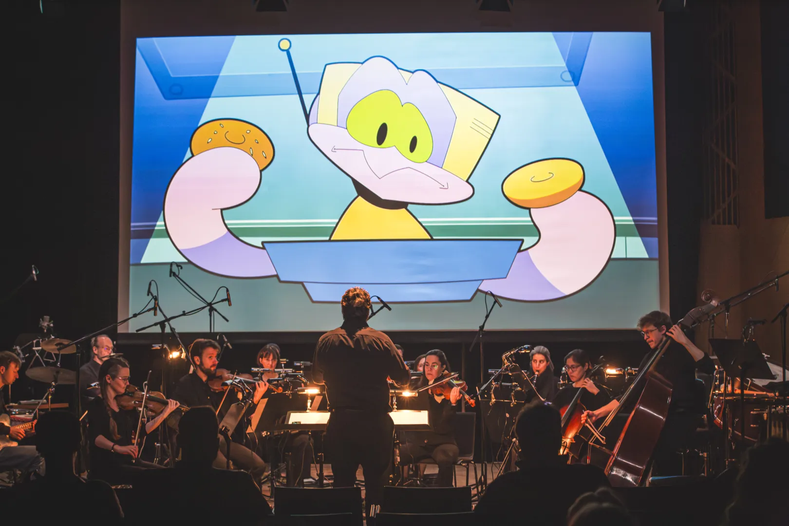 Zeichentrickfilm + Dirigent + Orchester