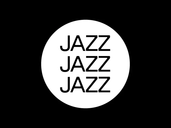 Weißer Kreis auf schwarzem Grund, darin geschrieben: JAZZ JAZZ JAZZ